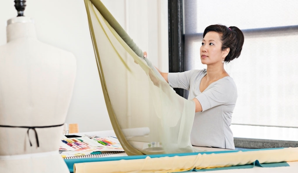 Woman in a fabric studio